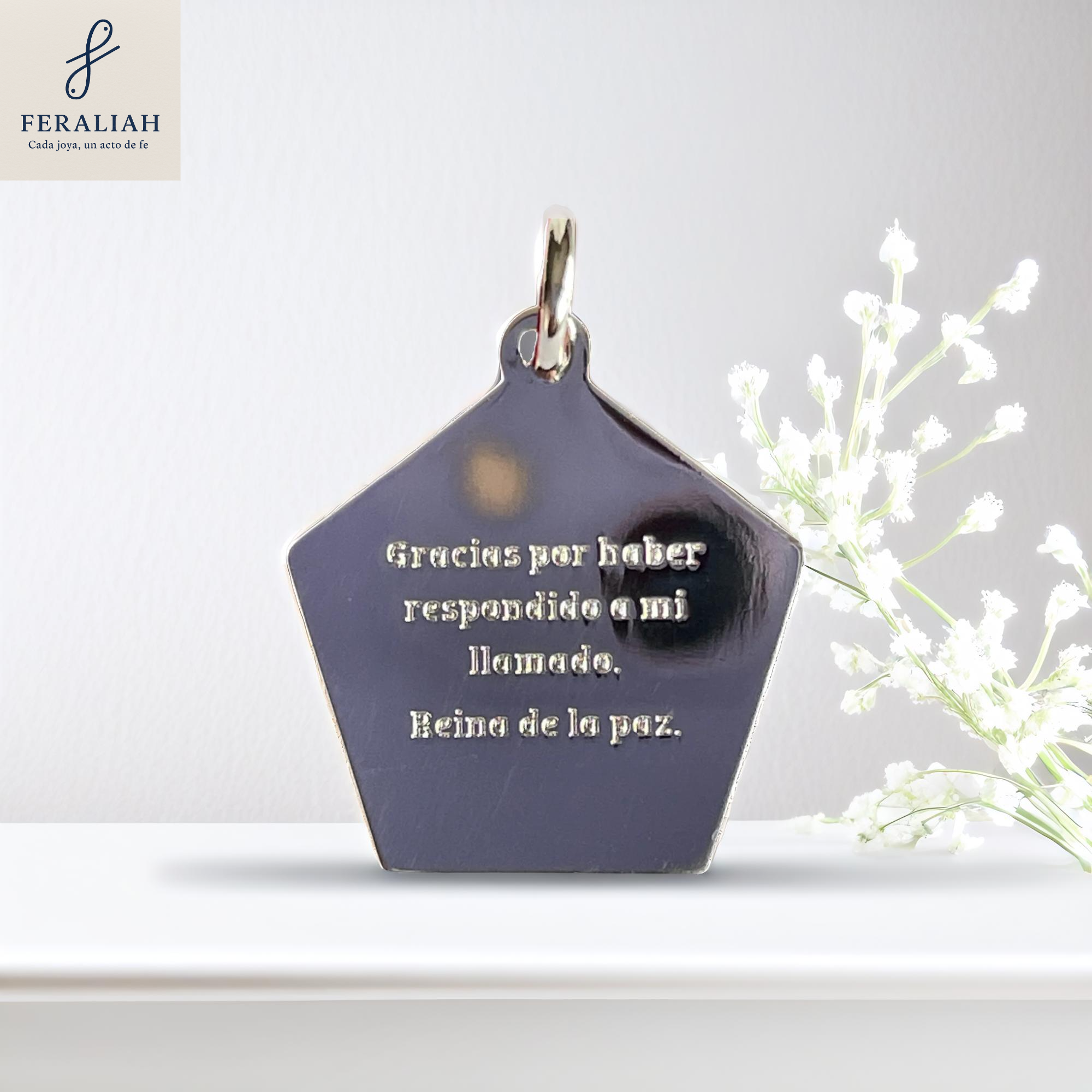 Medalla con cadena de plata